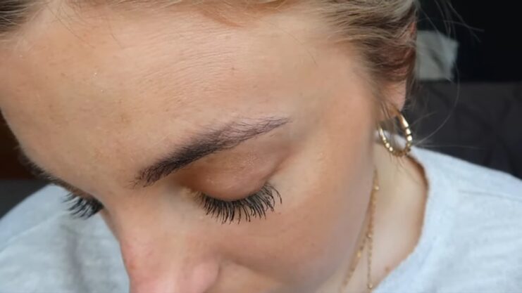 EYELASH serum drop in the eye